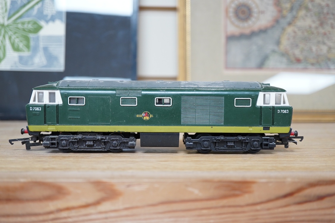 A quantity of 00 gauge railway by various makes, comprising; nine locomotives by Tri-ang, Hornby Dublo, etc. (one missing tender), sixteen maroon bogie coaches and eighteen freight wagons